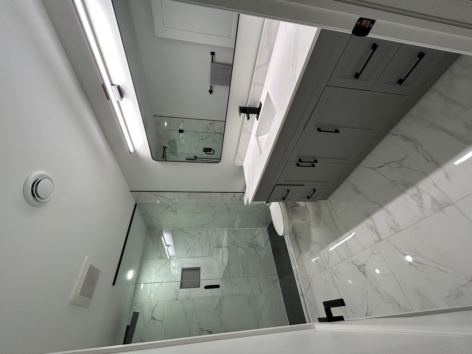 Marble bathroom with glass shower